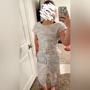 this cute romper is a M and it’s from the brand “pretty garden” off of amazon!